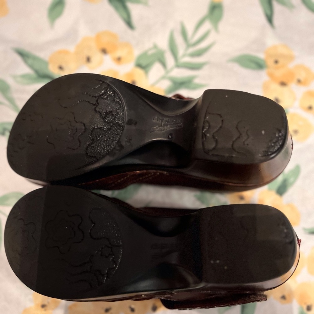 A Great Pair of Dansko Shoes in Size 38 with a Velcro Closure.